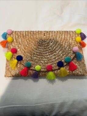Woven Straw Clutch with Colorful Pom Tassels